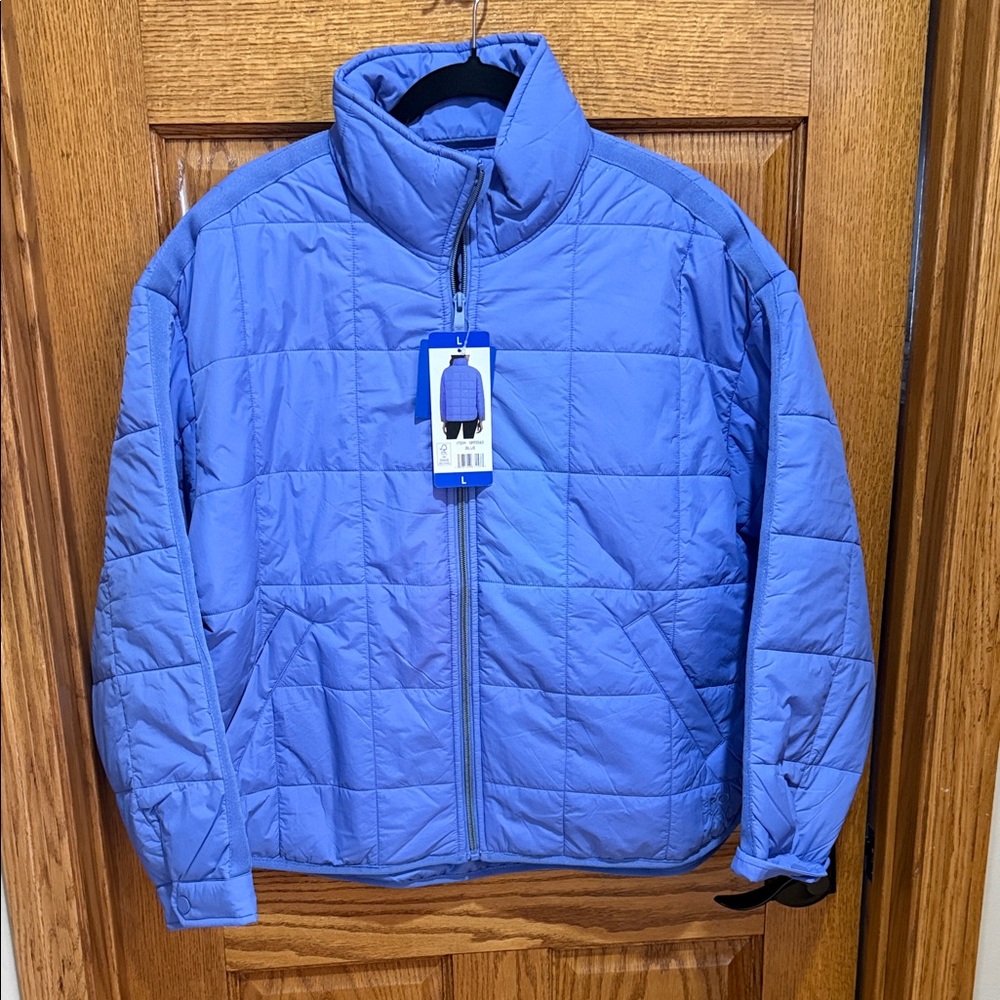 Roxy blue quilted Jacket. Size L. New with tags